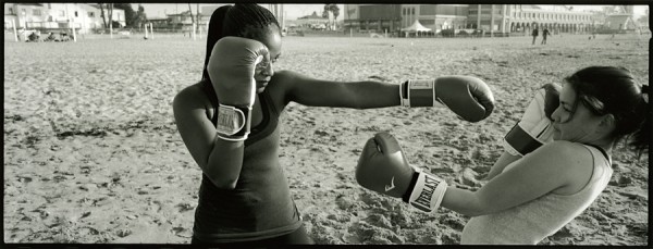 I recently bought a sweet, used panorama camera. This photo  is from my first field trip. Elora and Sammy practice Muay Thai on Main Beach, Santa Cruz.