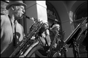 The scene on Pacific Avenue this afternoon. Some holiday spirit from the saxophone band with no name (but affiliated with the Jazz Society of Santa Cruz County).