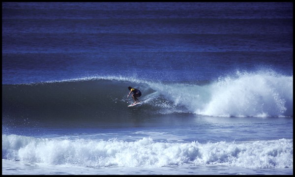 I took this one at Lennox Head, NSW, Australia. I bought an inexpensive telephoto lens in Fiji and thought I was going to be a surf photographer. 