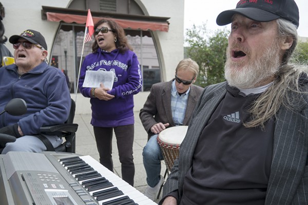 The Tin Can Band was out on Front Street this morning as they are every Wednesday morning singing and playing. 