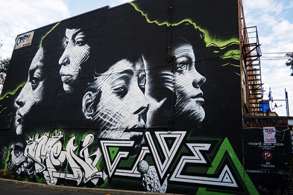 In July 2013 the first Montreal Mural festival took place on Saint-Laurent Blvd. Twenty street artists from all over the world were invited to create murals. This one was done by Omen, a Montreal local.