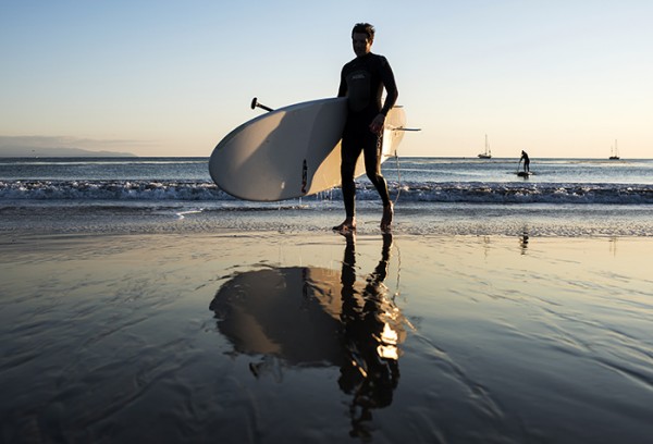 I snapped this photo on Thanksgiving. This couple had paddled over to The Lane to ride small, low tide waves and a great time. Now they were back on Seabright Beach, tired and hungry. It was a chilly evening, the light was nice, reflections  on the sand, turkey waiting. A moment, a mood.