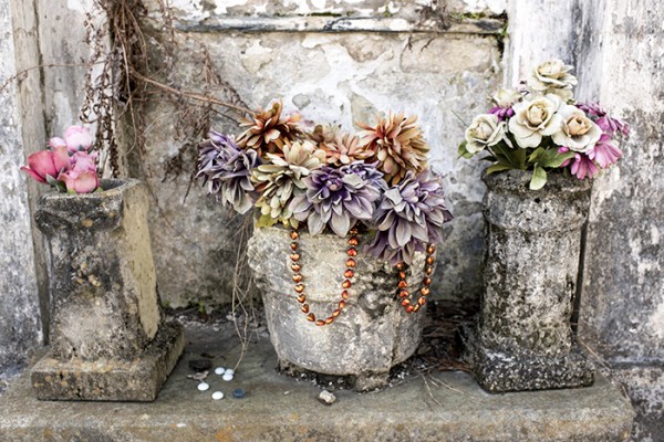 Flowers, Mardi Gras beads, small, smooth stones. muted tones.